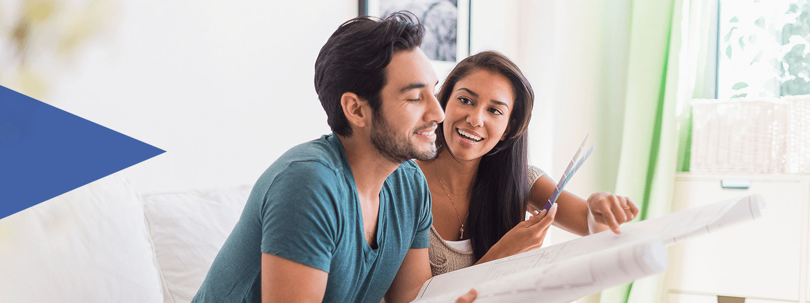 Couple Looking at Blueprints